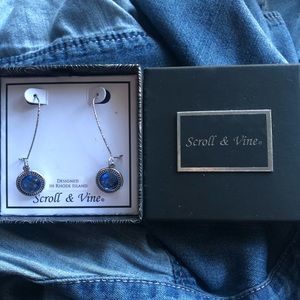 Silver-toned earrings with blue stones